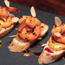 Appetizer: Spain – Canapés de Gambas y Almendras con Mantequilla de Pimentón (Shrimp and Almond Canapés with Paprika Butter) recipe