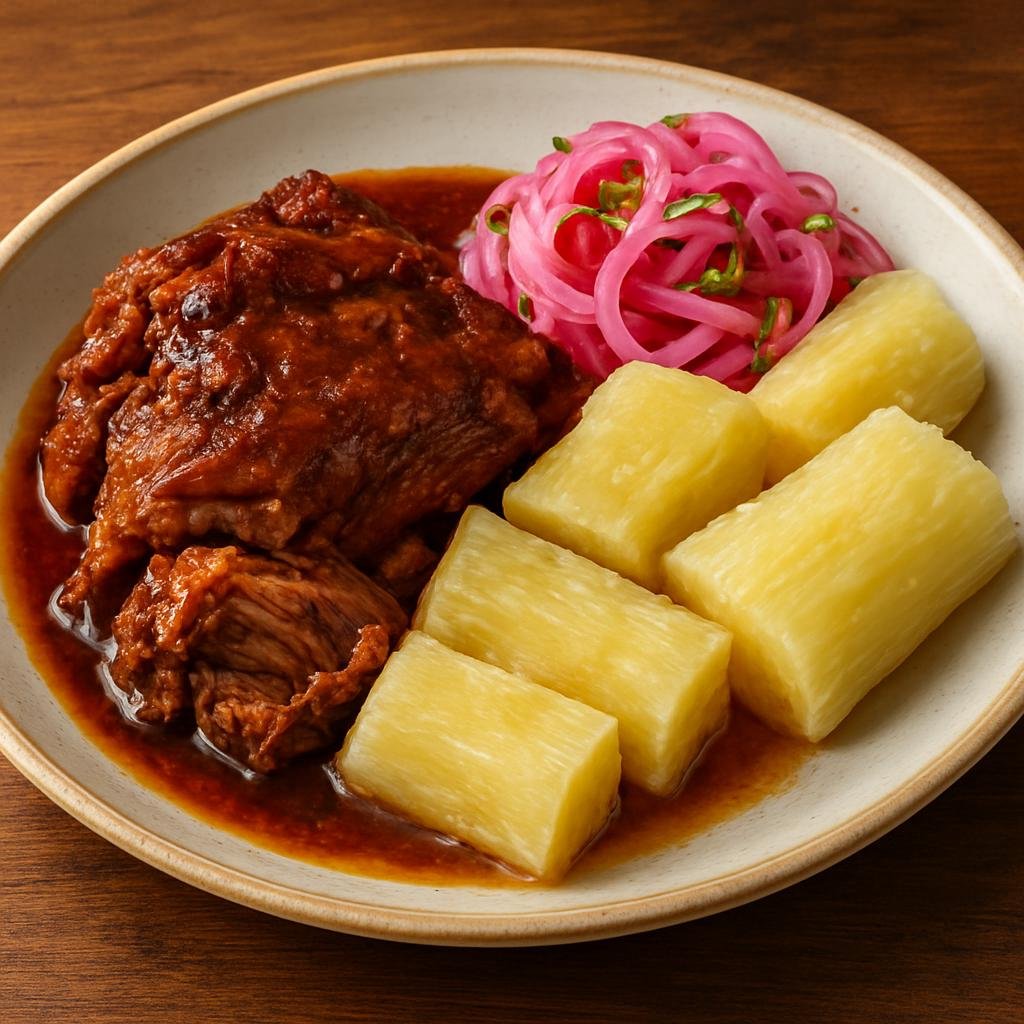 Entree: Nicaragua – National Cuisine – Chancho con Yuca (Braised Nicaraguan pork shoulder served with boiled cassava and pickled onions) recipe